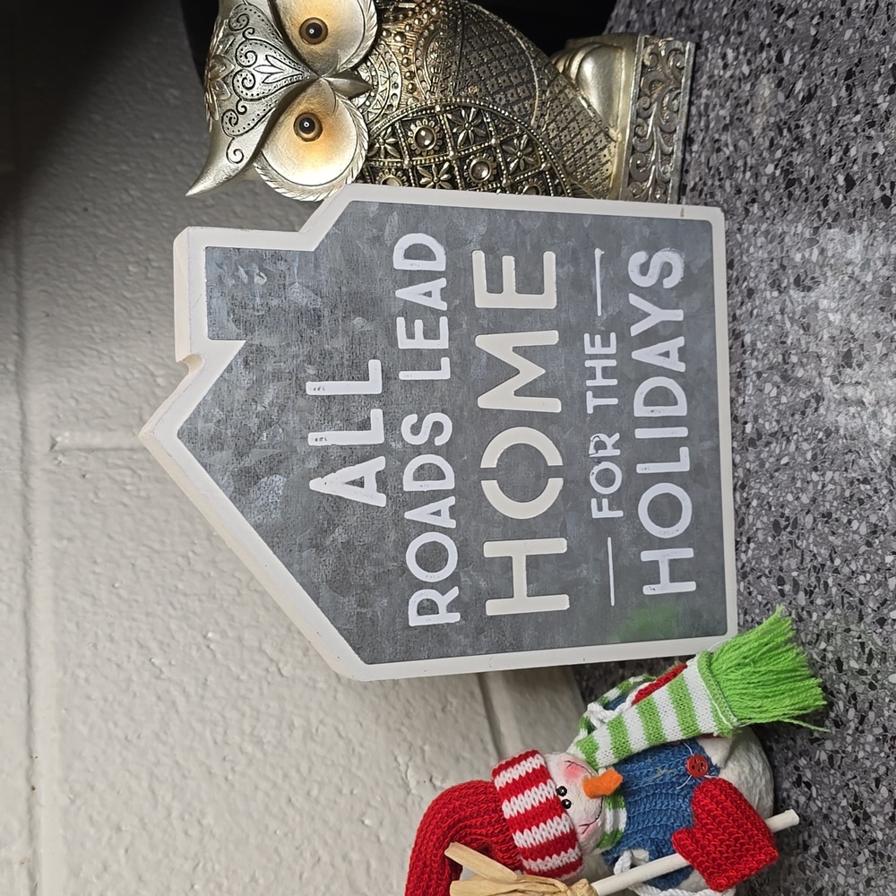 "All roads lead home for the holidays" wood and metal sign